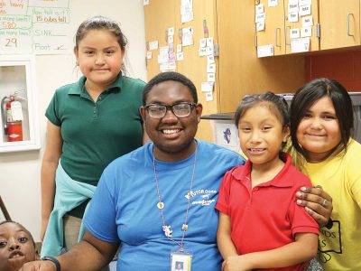 A Guadalupe tutor with kids