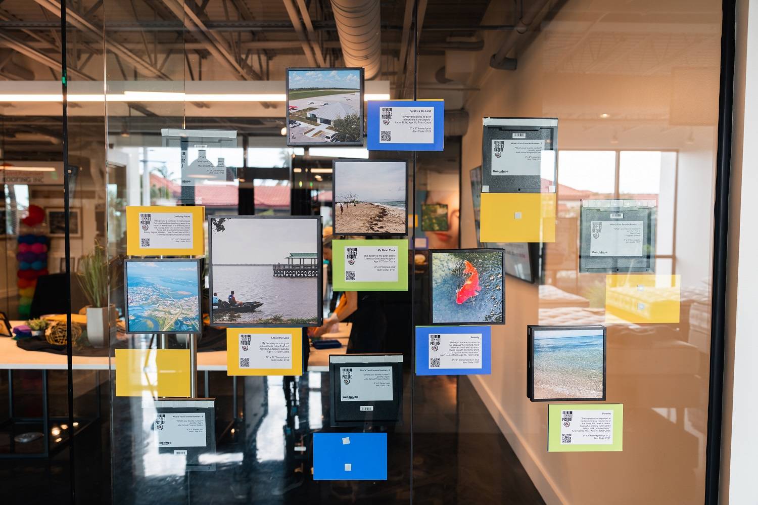 wall of student photography at seeing the bigger picture